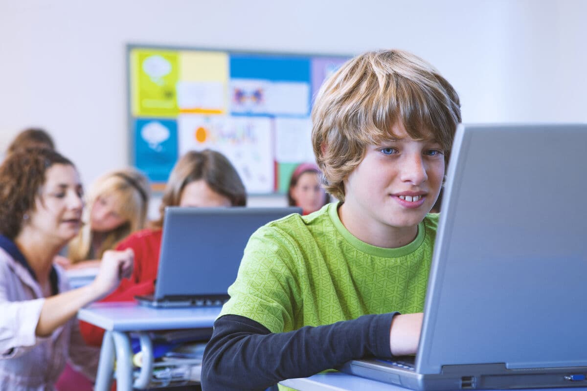 Student using a refurbished device